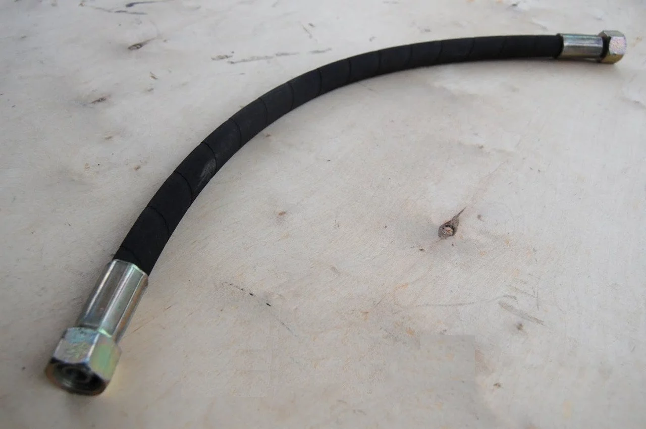 купить Шланг подъема платформы L= 610мм (г32+г32)